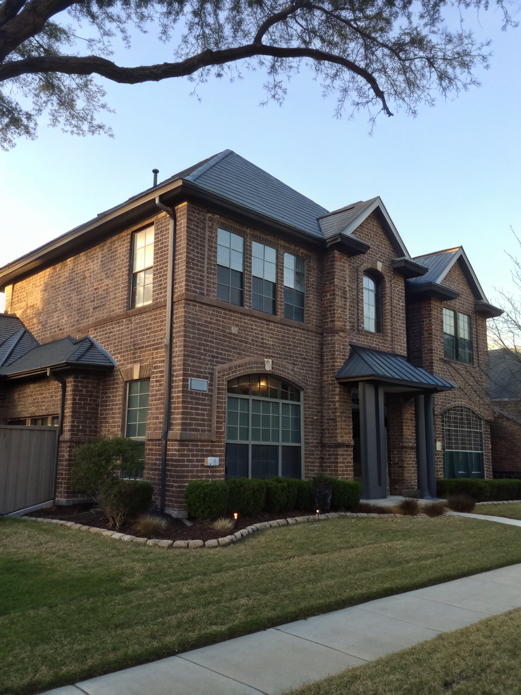 Contemporary home in McKinney featuring slim black aluminum replacement windows