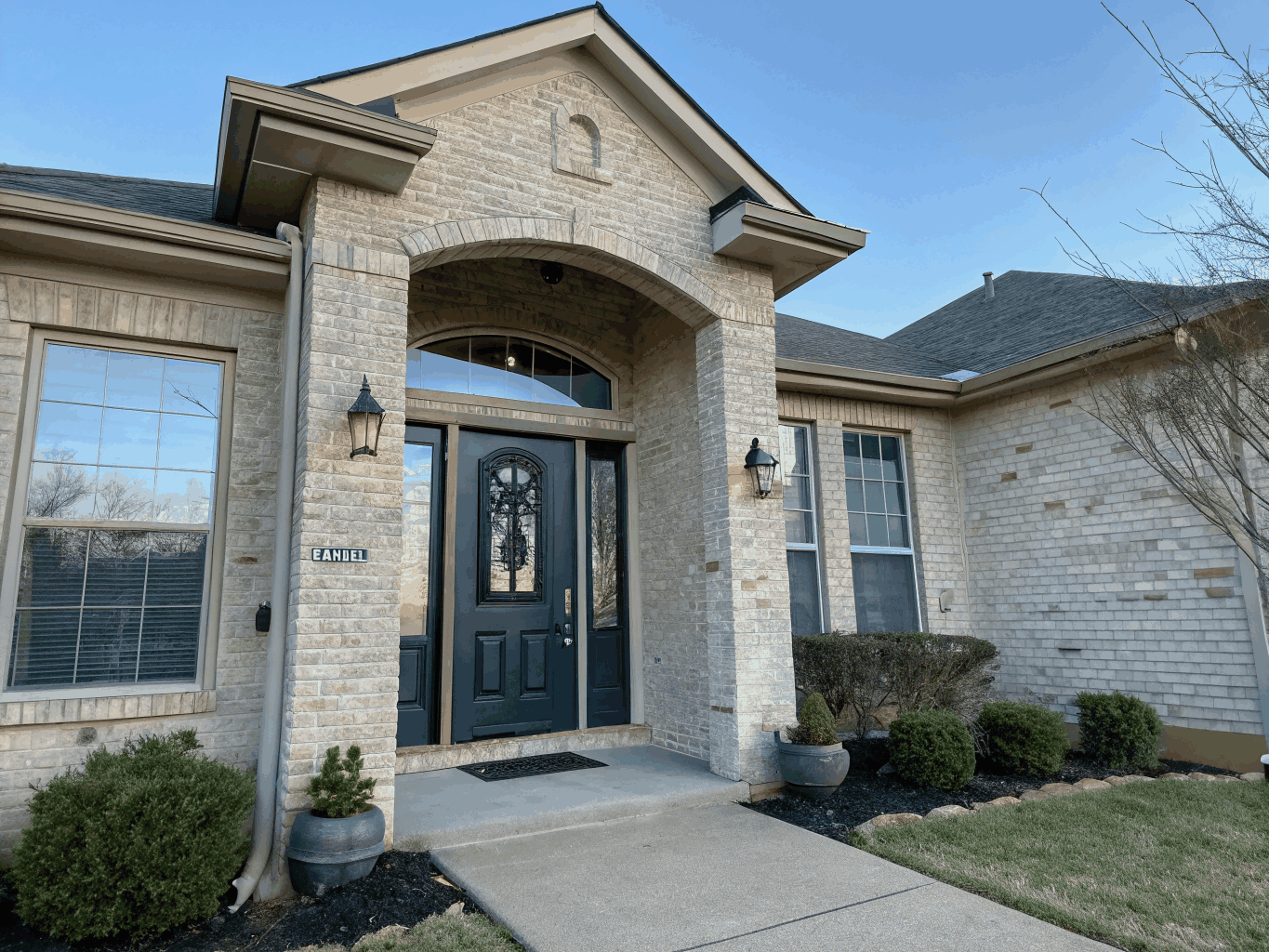 Modern craftsman entry door installed on a McKinney home